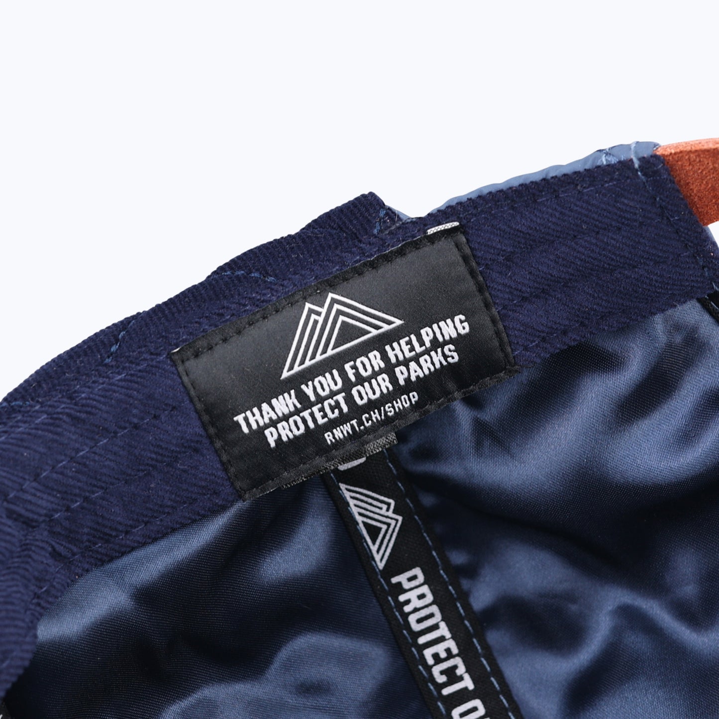 Protect Our Parks Bear 7 Panel Quilted Trapper Outdoor Cap - Navy/Orange